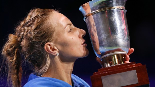 Russia's Svetlana Kuznetsova kisses her trophy.