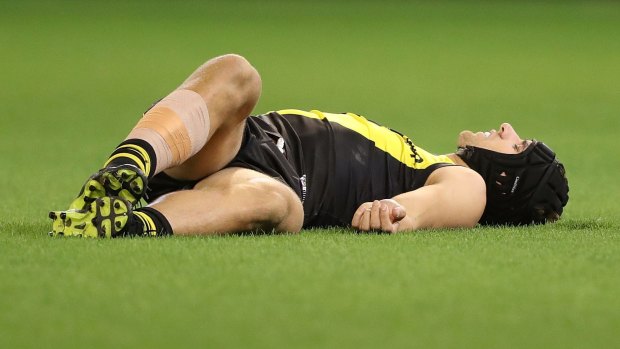 Griffiths after landing on his head. He suffered concussion in this round two, 2017 match against Collingwood. 