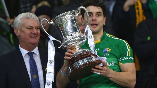 Ireland's Bernard Brogan
celebrates with the trophy.