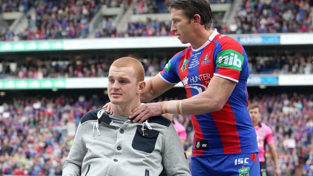 Brothers: Kurt Gidley and Alex McKinnon at Hunter Stadium turf for last year's Rise For Alex benefit match against the Titans.