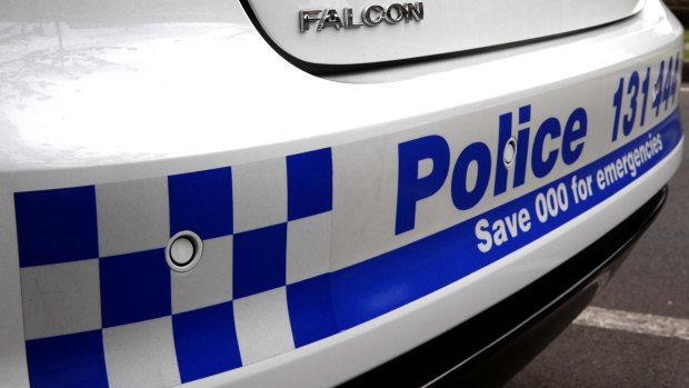 A taxi driver has disarmed a man who threatened him with a hammer.