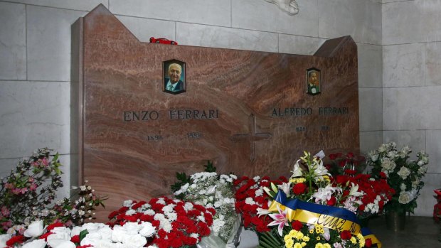 The tomb of Enzo Ferrari in a cemetery in Modena.