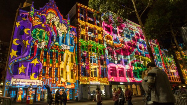 Happy return: Visitors oohed as  projections lit up Flinders Street from 9pm.