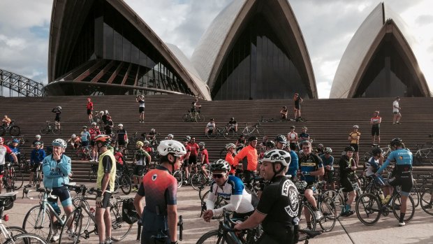 Cyclists on the Mike Hall memorial bike ride at the Opera House.