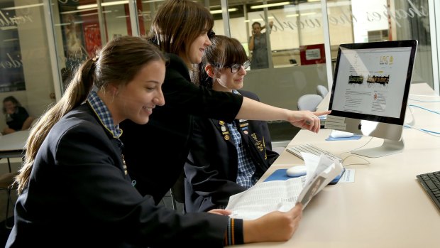 Lowther Hall VCE student Jasmine Tsiatsias (left) , teacher Carla Ziino  and student Mia Pavlatos (right) are learning about fake news in English.