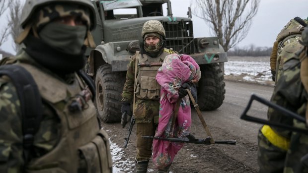 Ukrainian servicemen gather  in Artemivsk after withdrawing from Debaltseve.