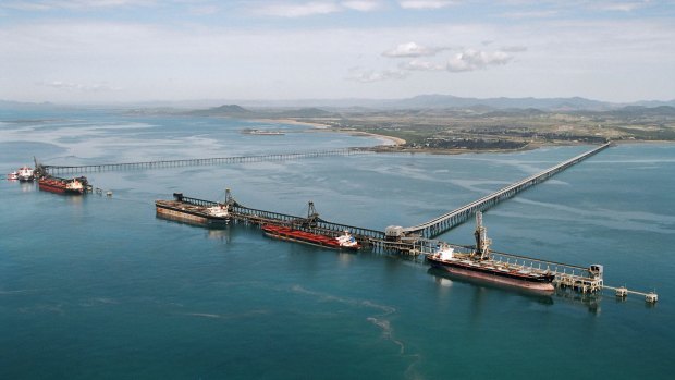 Coal carriers are loaded near Mackay. Australian exporters are sure to be hurt by China's current go-slow.