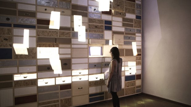 Nadia Frulli examines drawers full of diaries at the National Diary Archive Foundation in Pieve Santo Stefano, Italy.