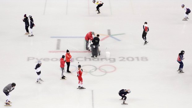 Skaters warm up during a speed skating training session in PyeongChang.