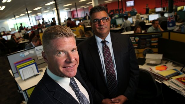 Acquire Learning Group Managing Director John Wall and the company's former advisory council chair Andrew Demetriou in November 2014.

