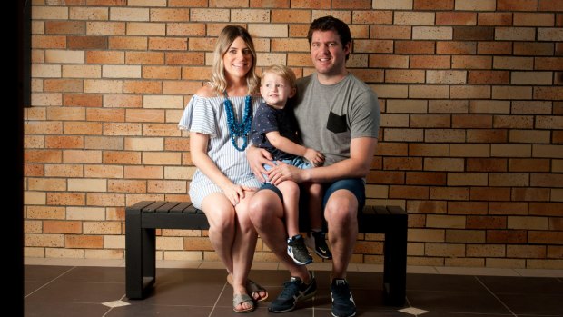 Naomi and Brad Lynn with son Mason, 2. The family bought a house with help from Naomi's dad.