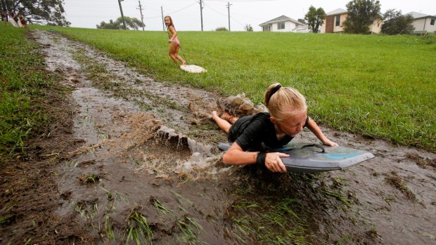 Riley Park is a popular spot for children to slide down the hill on bodyboards.