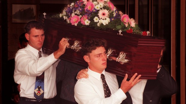 Alison Lewis' brothers, Nicholas and Phillip, carry her coffin from St Patrick's Catholic Church in Lithgow in 1997. 