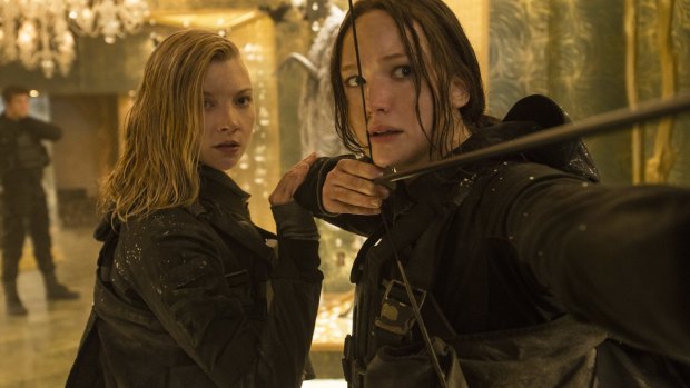 Natalie Dormer and Jennifer Lawrence, who has taken up her bow to fight for liberty.