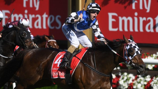 Damian Lane crosses the line on Tosen Stardom in the Emirates Stakes.
