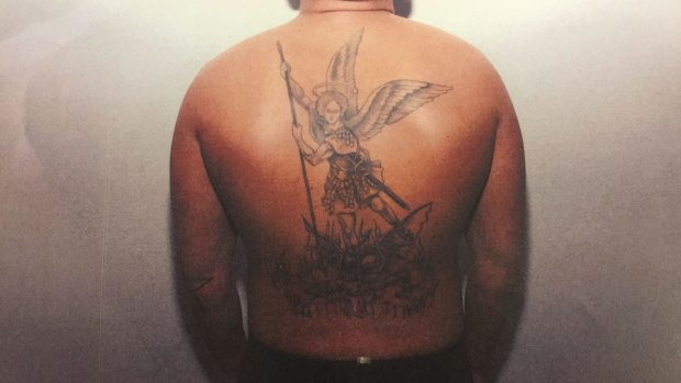 Diego Carbone's tattoo of Saint Michael.