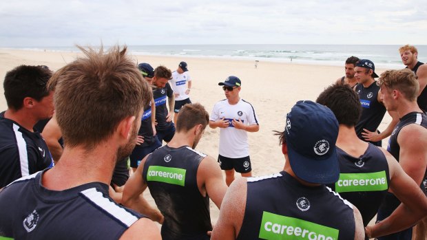 Carlton coach Brendon Bolton speaks to players during a training session.