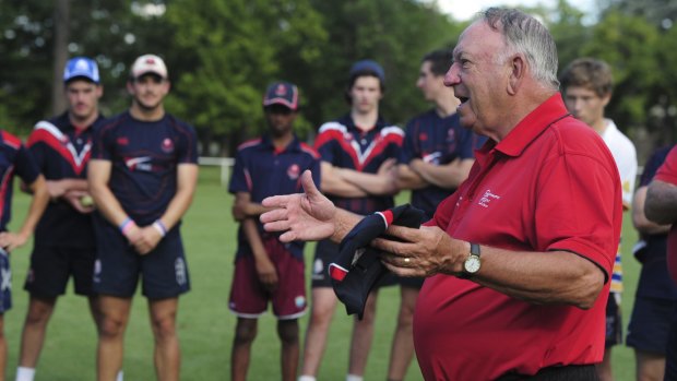 Former Australian test cricketer, Doug Walters, shares his knowledge with senior squad members of the Eastlake Cricket team at Kingston Oval.