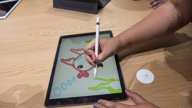 The Apple Pencil in use.