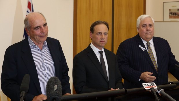 Environment Minister Greg Hunt with Bernie Fraser, left, and Clive Palmer, right. 
