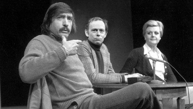 Edward Albee, left, makes a point as director Paul Weidner  and actress Angela Lansbury look on during a theatrical briefing in 1977.