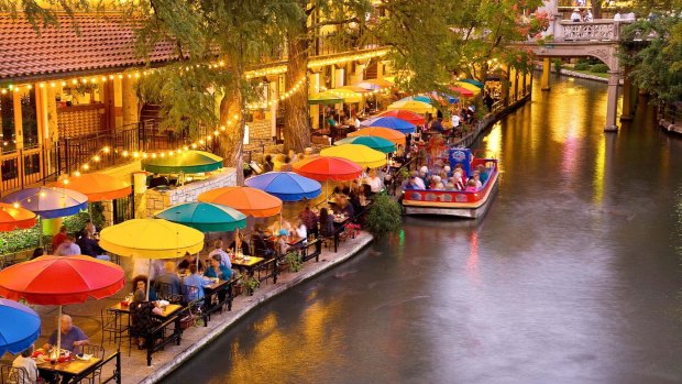 The pedestrian-only section of the river walk is lined with restaurants, cafes, shops, artwork and hotels.