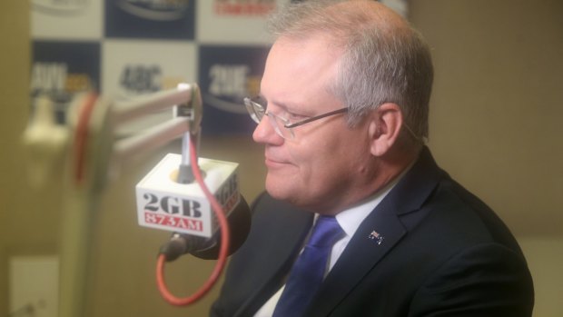 Treasurer Scott Morrison gives a radio interview at Parliament House on Monday.