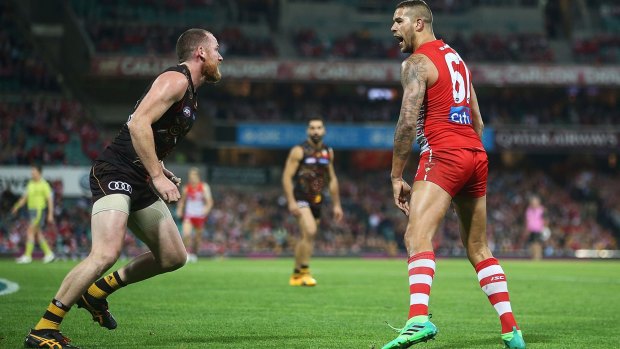 Rough house: Lance Franklin and Jarryd Roughead put aside their mateship at the SCG.