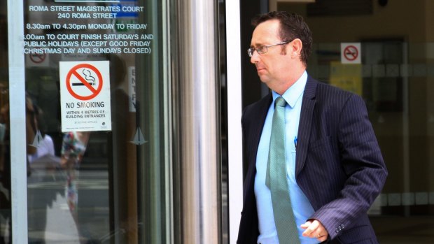 Craig Pratt, defence solicitor for Senior Constable Colin Randall, leaves the Roma Street Magistrates Court on Monday.
