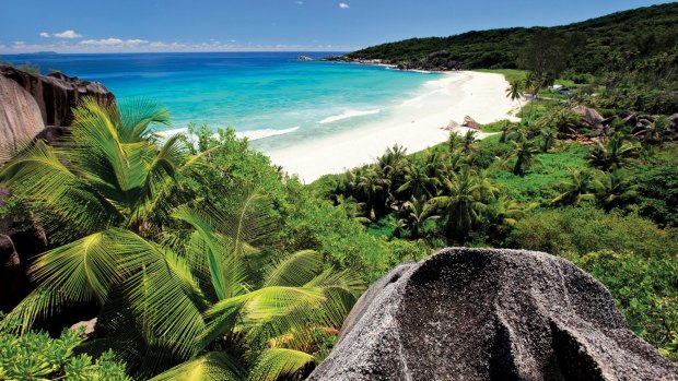 A beach in the Seychelles where TitanTrade website operator One Tech Media is located.  