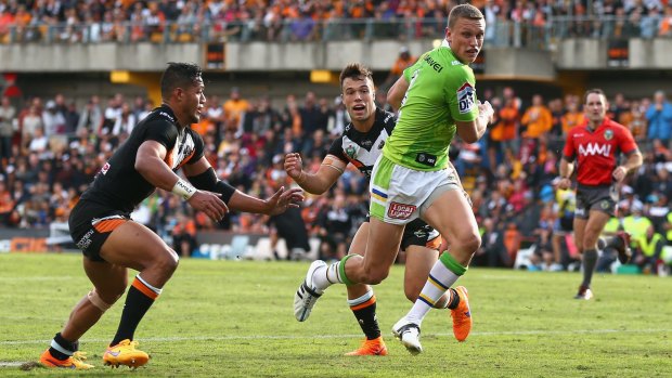 Jack Wighton of the Raiders breaks through the Tigers defence during the round seven NRL match between the Wests Tigers and the Canberra Raiders at Leichhardt Oval.