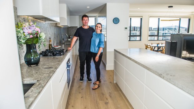 Developer Matt James, of Crafted with fiancee Annie Moses in their kitchen which is no short of bench or storage space.  