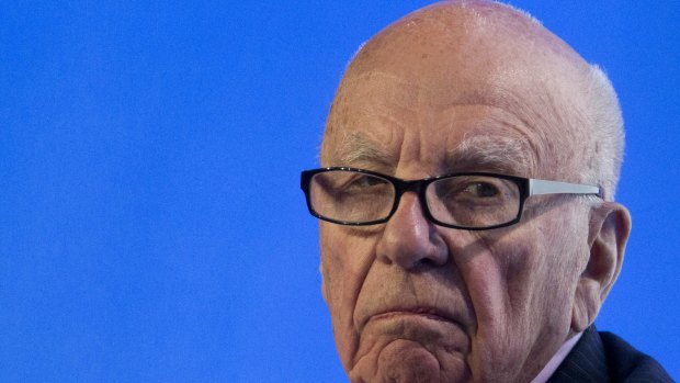 Low interest rates and governments printing money push up the price of assets, rewarding the wealthy owners of assets, Mr Murdoch told his high-powered audience.