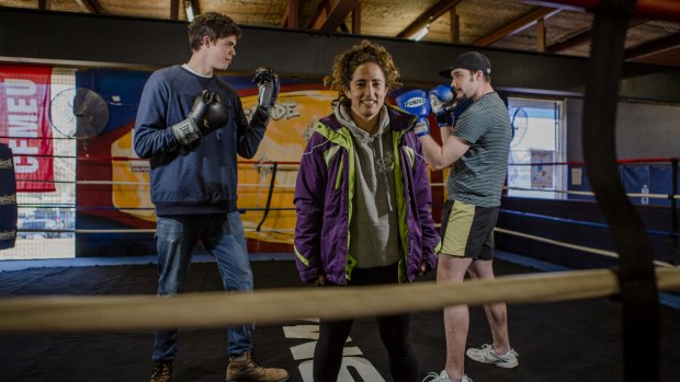 Pilot program for vulnerable youth at Stockade training centre. Front, Canberra boxer Bianca Elmir, with two students who are part of the program (from left) Michael Watt, 20, and Lachlan Thinius, 22.