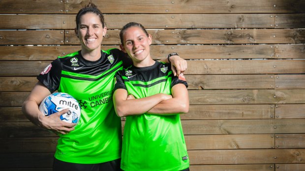 Canberra United foundation players Ash Sykes and Caitlin Munoz.