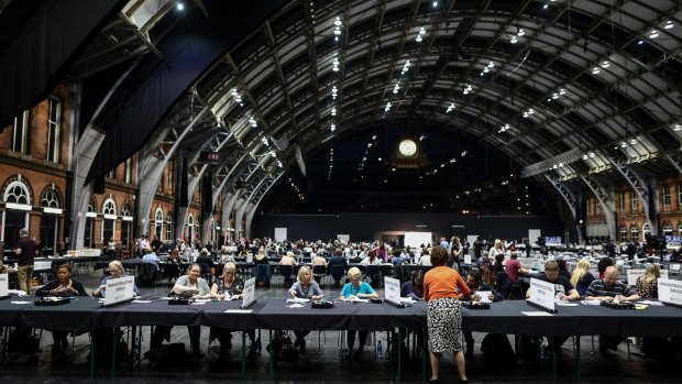 Tellers count ballot papers for the European Union (EU) referendum at Manchester Central Convention Complex in Manchester.