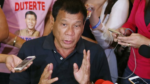 Presidential front-runner Rodrigo Duterte answers questions from the media.