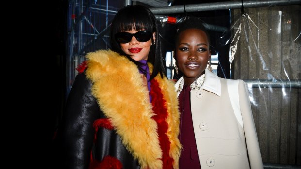 Rihanna and Lupita Nyong'o at the 2014 fashion show that sparked a meme and Netflix movie.