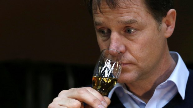 Liberal Democrat leader and Deputy Prime Minister Nick Clegg takes to whisky during a campaign visit to Inverness, Scotland.