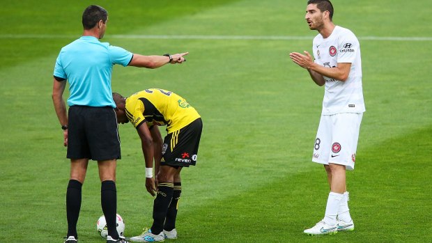 Iacopo La Rocca pleads with the referee after the Phoenix's Roy Krishna is awarded a controversial penalty.
