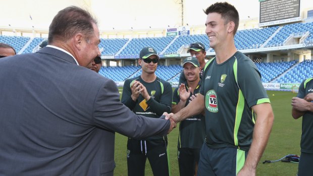 Mitch Marsh receives his baggy green from his father Geoff.