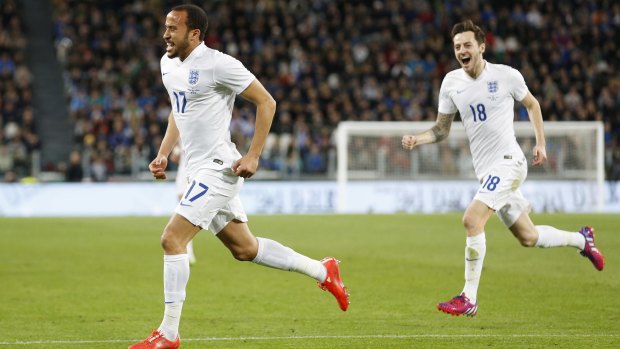 Andros Townsend celebrates with Ryan Mason after scoring for England.