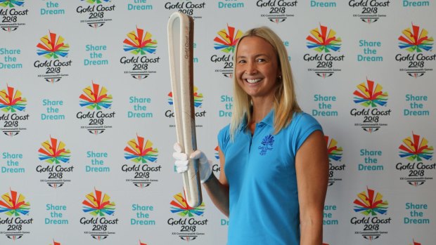 Olympic gold medallist Brooke Hanson with the Queen's Baton.