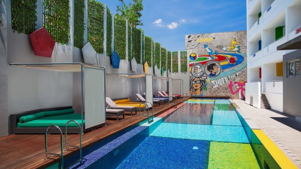 Makes you smile: The pool and graffiti wall at Luna2.