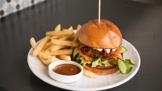 The Marrickville Burger is a fried chicken burger spiked with yeeros spices and served with a banh mi-inspired salad.