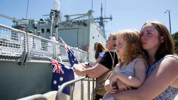 Families watch as the crew of HMAS Darwin departs for a tour of duty in the Gulf.