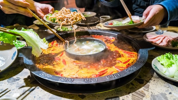 Chengdu hot pot served in a sichuan chafing dish. The dish was very popular in the region of sichuan and chongqing before becoming favoured by the whole china