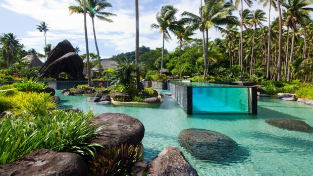 Laucala's spectacular glass-sided swimming pool.