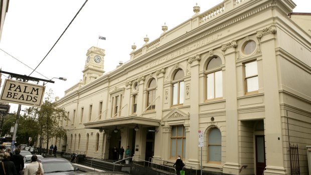 Plans to redevelop the Prahran library, at the back of the town hall, (pictured) would cost at least $23 million, Stonnington Council has been told.