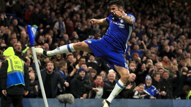 Kick start: Chelsea's Diego Costa celebrates scoring his side's fourth goal against Middleborough.